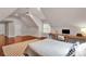 Bonus room with hardwood floors, a desk, and a vaulted ceiling at 4552 Sawgrass Ct, Denver, NC 28037