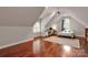 Large bonus room with hardwood floors, a desk, and ample natural light at 4552 Sawgrass Ct, Denver, NC 28037