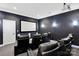 Home theater with comfortable seating and a large screen for entertainment at 4552 Sawgrass Ct, Denver, NC 28037