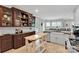 Gourmet kitchen boasts custom cabinets, countertops, and large sink at 4552 Sawgrass Ct, Denver, NC 28037