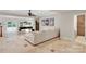 Open living room with a pool table, lots of seating, and access to the outdoors at 4552 Sawgrass Ct, Denver, NC 28037