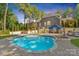 Backyard pool with patio, umbrella table, lounge chairs, and a beautiful treed perimeter at 4552 Sawgrass Ct, Denver, NC 28037