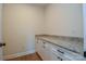 Bathroom with white cabinetry, granite countertop, and bronze hardware at 1524 Conestoga Xing, Catawba, NC 28609