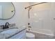 Bathroom with granite vanity, sink, toilet and a shower and tub combo at 1524 Conestoga Xing, Catawba, NC 28609