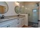 Modern bathroom with double vanity, granite countertops, and glass shower at 1524 Conestoga Xing, Catawba, NC 28609