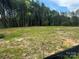 Homesite surrounded by trees, with erosion control fence, awaits your dream home at 1524 Conestoga Xing, Catawba, NC 28609