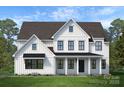 New construction home boasts a white exterior, black accents, and a beautifully manicured front yard at 11318 James Coy Rd # Devonshire, Davidson, NC 28036