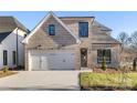 Beautiful brick home featuring an attached two-car garage and well-maintained landscaping at 8159 Fairview Rd, Charlotte, NC 28226