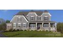 Charming two-story home with stone accents, a covered front porch, and a lush green lawn at 841 Lake Forest Dr # Hawthorne, Belmont, NC 28012