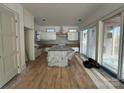 Modern kitchen with an island and hardwood floors at 715 Charles Ave, Charlotte, NC 28205