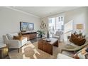 Bright living room with a large window, stylish furniture, and elegant decor at 1015 Kokomo Ln # 22, Charlotte, NC 28206