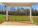 Wooden deck overlooking a wooded backyard at 179 Heartland Dr # 8, Rock Hill, SC 29732