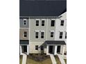 Aerial view of new townhomes with varied facade colors and landscaping at 4229 S New Hope Rd # 11, Cramerton, NC 28032