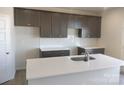 New kitchen with white countertops, stainless steel sink, and gray cabinets at 4229 S New Hope Rd # 11, Cramerton, NC 28032