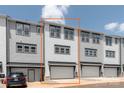 New construction townhome featuring a one car garage and neutral gray and white color scheme at 417 Prine Pl # Brx0013, Charlotte, NC 28213
