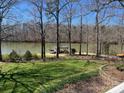 Beautiful water view with dock and covered area at 501 Nivens Cove Rd, Mount Holly, NC 28120