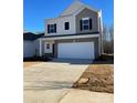 Two-story home with neutral siding and a two-car garage at 1229 Red River Dr, Salisbury, NC 28144