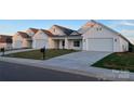 Street view of several newly built white homes featuring modern farmhouse architecture at 120-B Deer Brook Dr, Shelby, NC 28150