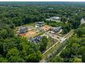 Aerial view of new luxury homes in a wooded community at 8022 Litaker Manor Ct, Charlotte, NC 28270