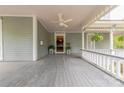 Spacious front porch with wood flooring and ceiling fan at 404 W Kerr St, Salisbury, NC 28144