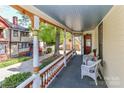 Inviting porch featuring comfortable seating and decorative accents at 235 Walnut St, Statesville, NC 28677