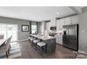 Spacious kitchen featuring stainless steel appliances and an island at 452 Moondance Dr, Gastonia, NC 28054