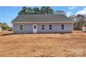 A newly constructed home exterior awaiting landscaping at 6160 Lowder Rd, Salisbury, NC 28147