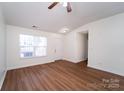 Spacious living room featuring hardwood floors and lots of natural light at 2327 Hope Valley Ln, Charlotte, NC 28213