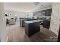 Stylish kitchen with a functional island, stainless steel appliances, and ample cabinet space at 805 W Main St, Marshville, NC 28103