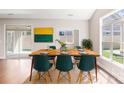Bright dining area features a large window and glass doors leading to the patio at 833 A Wynnshire Dr # 56, Hickory, NC 28601