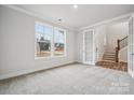 Spacious office with French doors, hardwood floors, and natural light at 108 Brooke Forest Ct, Mooresville, NC 28115