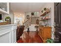 Bright entryway with hardwood floors and built-in shelving at 3203 Kelsey Plz, Kannapolis, NC 28081