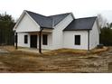 White house with black roof and covered porch at 1239 Beltline Rd # 10, Chester, SC 29706