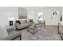 Cozy living room showcasing modern decor, neutral furniture, and a well-lit atmosphere at 3655 Mercer St, Terrell, NC 28682