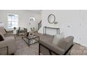 Inviting living room with a staircase, contemporary furnishings, and stylish decor at 3663 Mercer St, Terrell, NC 28682