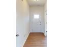 Bright entryway with wood-look flooring and a white front door with decorative window insert at 2054 Van Buren Rd, Sherrills Ford, NC 28673