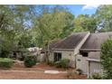 Aerial view of townhouses with surrounding trees and a glimpse of a pool at 35 Old Post Rd, Clover, SC 29710