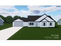 Modern home with a white exterior, a large driveway, and black accents at 6169 Long Branch Rd, Salisbury, NC 28147