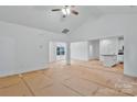 Open concept living space featuring white walls, high ceilings, and ample natural light at 6169 Long Branch Rd, Salisbury, NC 28147
