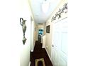 Inviting hallway with dark wood floors and neutral walls, creating a warm and welcoming entrance at 916 Roxburgh Ave, Rock Hill, SC 29732