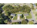 An aerial view showcases the home's location amidst a neighborhood with mature trees at 927 Kearney Dr, Shelby, NC 28152