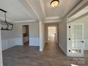 Bright and spacious entry hall with hardwood floors and access to other rooms at 5031 Mclaughlin Loop # 60, Waxhaw, NC 28173