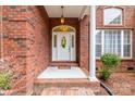 Charming brick home featuring a bright front entrance with brick columns at 2518 Wellesbourne Ln, Sherrills Ford, NC 28673