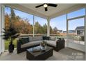 Screened porch with comfortable seating, perfect for relaxing at 8336 Acadia Pkwy, Sherrills Ford, NC 28673