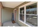 Inviting front door entry with a welcoming sign and a porch at 528 Moss Springs Rd, Albemarle, NC 28001