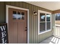 Detailed view of the front door and entryway at 528 Moss Springs Rd, Albemarle, NC 28001