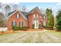 Two story brick home with a spacious yard and basketball goal at 2804 Providence View Ln, Charlotte, NC 28270