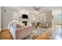 Bright living room with hardwood floors, fireplace and comfortable seating at 2804 Providence View Ln, Charlotte, NC 28270