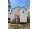Back exterior view of home featuring wood steps to grade at 1137 6Th St, Lancaster, SC 29720