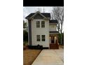 Charming two-story home with a well-manicured lawn and inviting entrance at 1137 6Th St, Lancaster, SC 29720